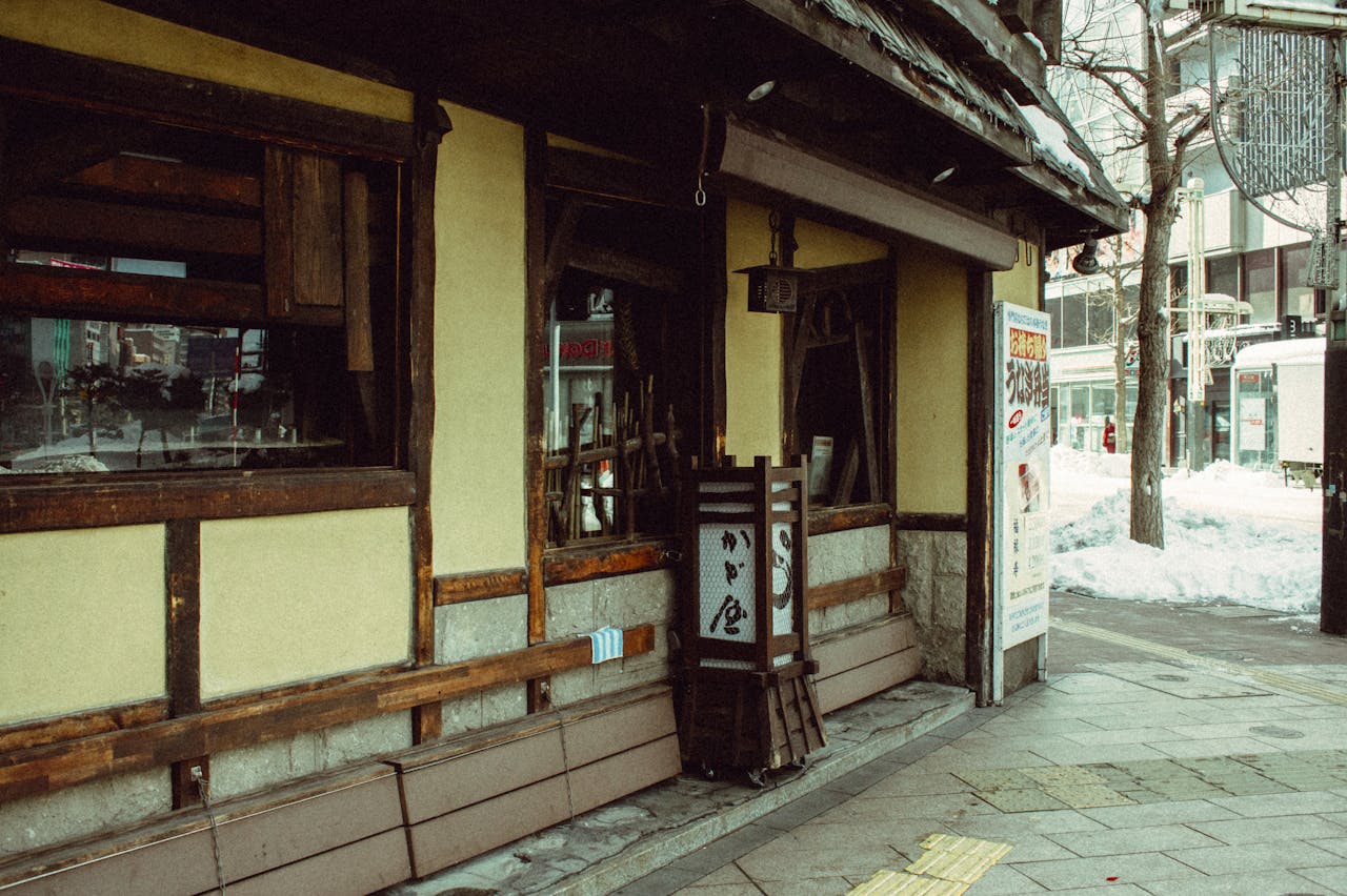A rustic building in snowy Date, Hokkaido, Japan showcasing traditional architecture.