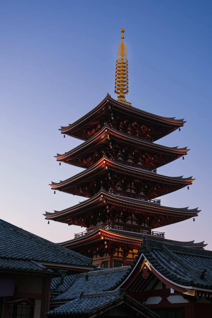 A stunning pagoda in Tokyo, Japan, captured at sunset with vibrant skies.